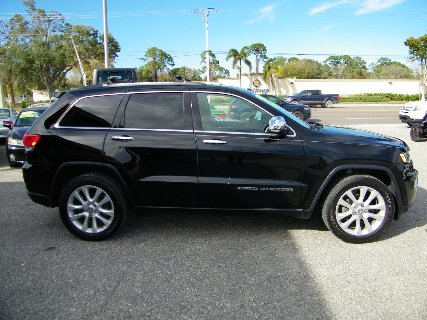 2017 Black /Black Jeep Grand Cherokee Limited (1C4RJEBG4HC) with an 3.6L V6 engine, Automatic transmission, located at 4000 Bee Ridge Road, Sarasota, FL, 34233, (941) 926-0300, 27.298664, -82.489151 - Photo#3